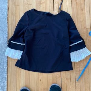 Ivanka Trump black top with fun sleeves